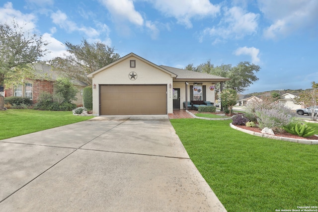 ranch-style home with a front yard and a garage