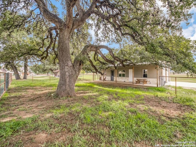 338 Salt Grass Trl, Bandera, TX 78003 - view of yard with a patio area
