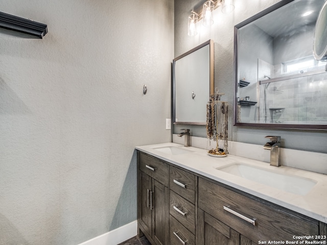 bathroom with vanity and walk in shower