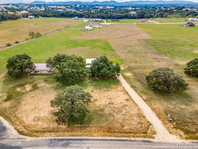 drone / aerial view with a rural view and a mountain view