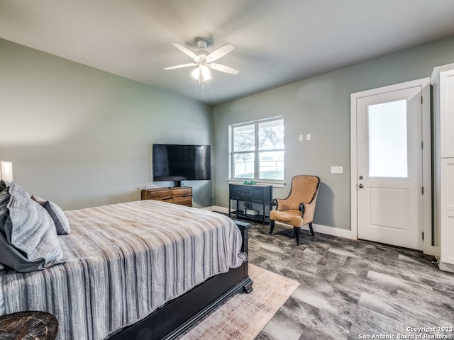 bedroom featuring wood-type flooring and ceiling fan