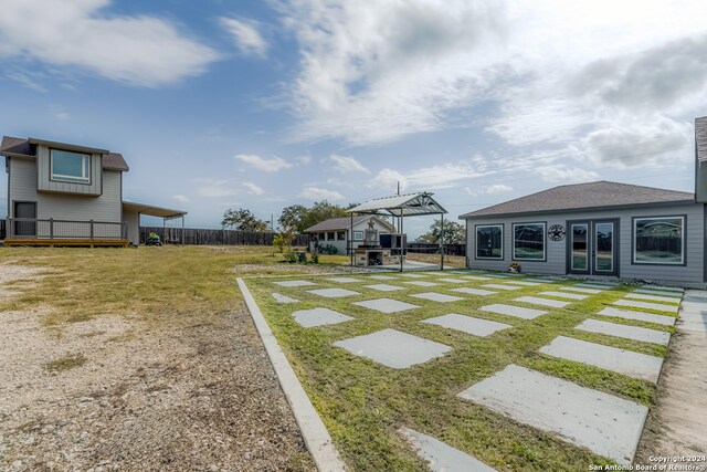 view of yard with a wooden deck