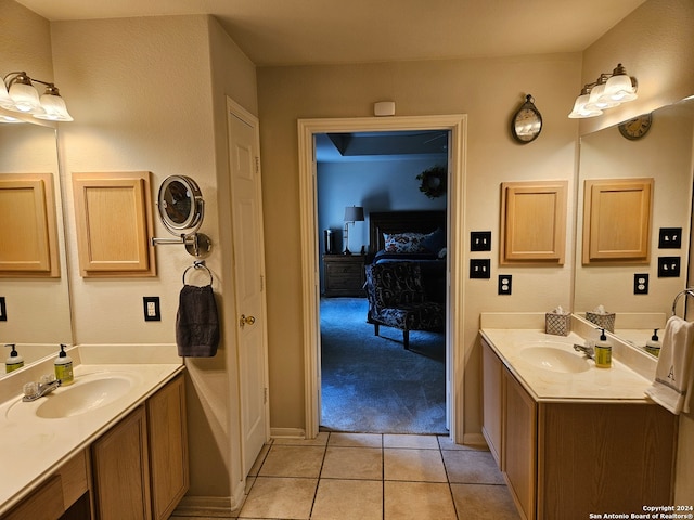 bathroom with vanity and tile patterned floors