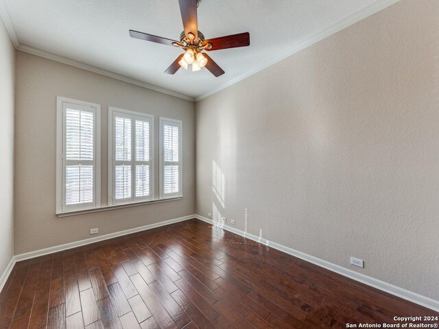 819 Tiger Lily, San Antonio, TX 78260 - spare room with dark wood finished floors, ceiling fan, baseboards, and crown molding