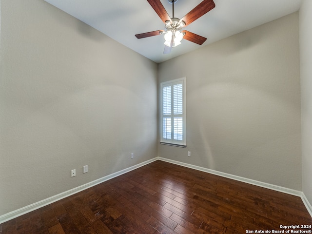 spare room featuring hardwood / wood-style flooring and ceiling fan