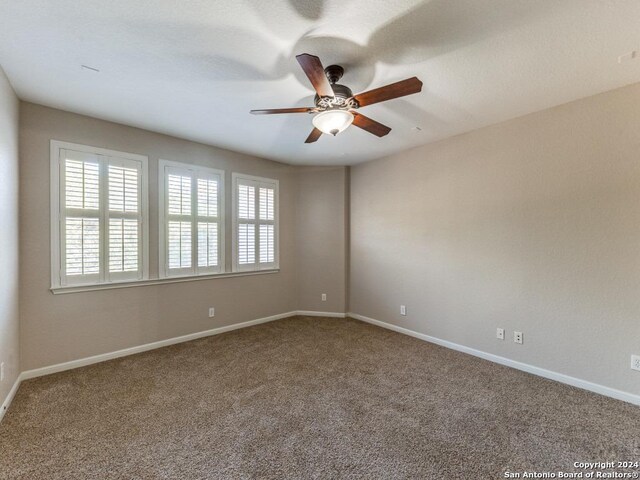 819 Tiger Lily, San Antonio, TX 78260 - carpeted spare room featuring a ceiling fan and baseboards