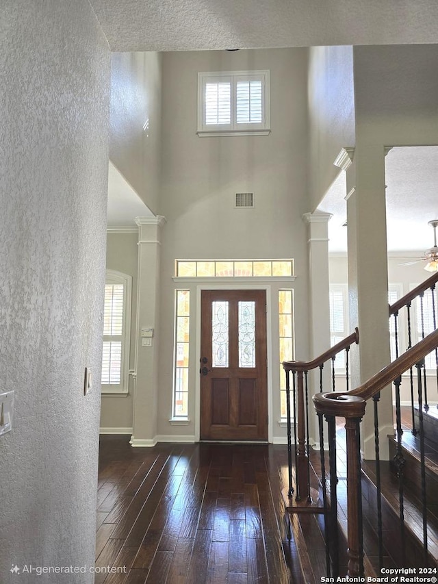 819 Tiger Lily, San Antonio, TX 78260 - entryway with a textured wall, wood-type flooring, healthy amount of natural light, ceiling fan, and baseboards