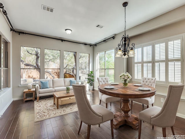 819 Tiger Lily, San Antonio, TX 78260 - dining space with a chandelier, baseboards, and dark wood finished floors