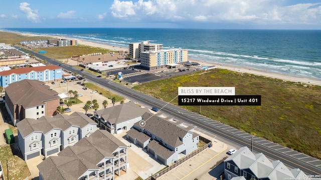 bird's eye view with a view of the beach and a water view