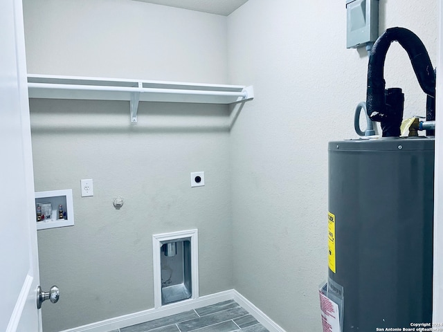 clothes washing area with gas dryer hookup, washer hookup, hookup for an electric dryer, and water heater