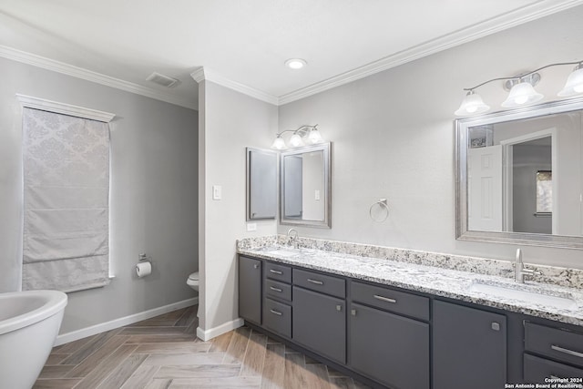 bathroom featuring a tub to relax in, toilet, parquet floors, crown molding, and vanity