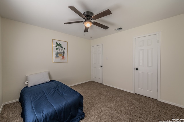 carpeted bedroom featuring ceiling fan