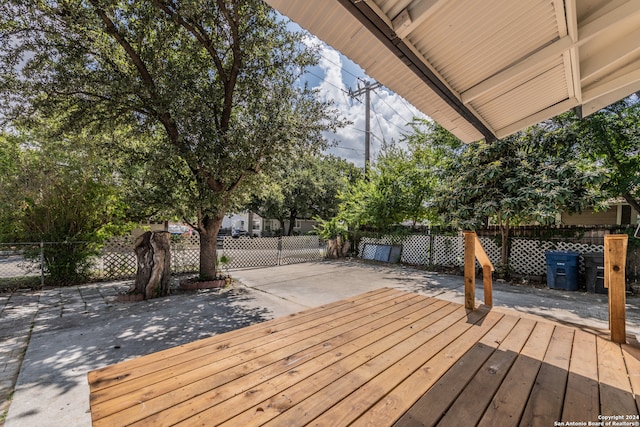 wooden deck featuring a patio area