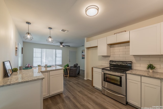 kitchen featuring white cabinets, hanging light fixtures, electric range, ceiling fan, and dark hardwood / wood-style floors