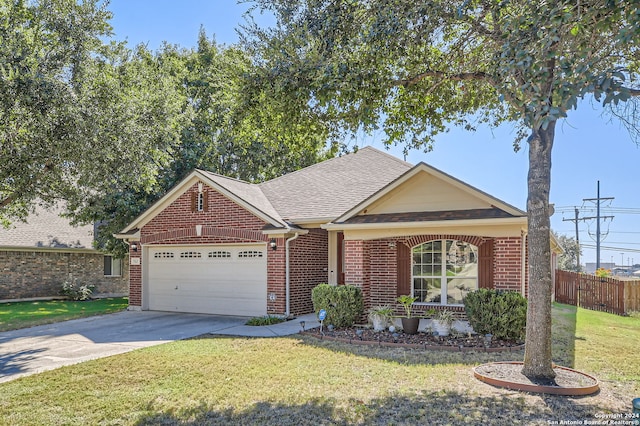 single story home with a garage and a front lawn