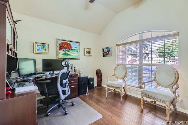 office space with hardwood / wood-style flooring and vaulted ceiling