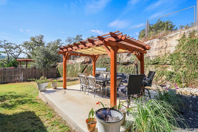 view of patio featuring a pergola