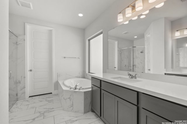 24054 Sidehill Lie, San Antonio, TX 78261 - bathroom featuring a marble finish shower, marble finish flooring, a bath, vanity, and recessed lighting