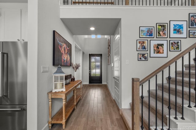 24054 Sidehill Lie, San Antonio, TX 78261 - foyer featuring wood finished floors, baseboards, stairs, and recessed lighting