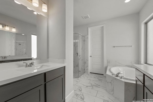 24054 Sidehill Lie, San Antonio, TX 78261 - full bath with marble look tile flooring, a marble finish shower, a garden tub, recessed lighting, and vanity