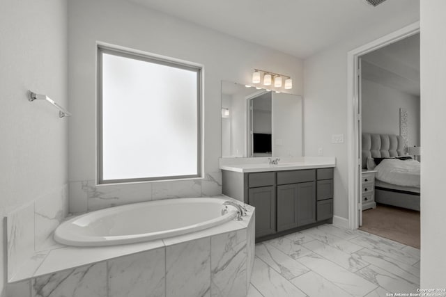 24054 Sidehill Lie, San Antonio, TX 78261 - ensuite bathroom with marble finish flooring, vanity, and a garden tub