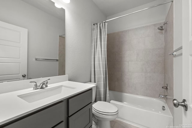 full bathroom with toilet, shower / tub combo with curtain, vanity, and tile patterned floors