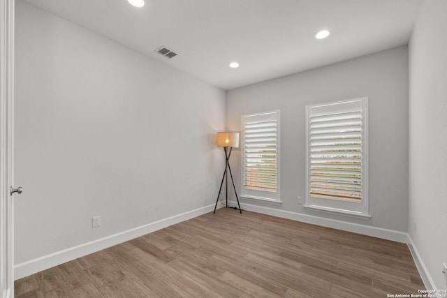 24054 Sidehill Lie, San Antonio, TX 78261 - unfurnished room with wood finished floors, baseboards, and recessed lighting