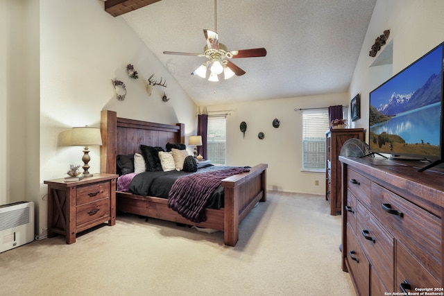 bedroom with ceiling fan, a textured ceiling, high vaulted ceiling, beamed ceiling, and light colored carpet