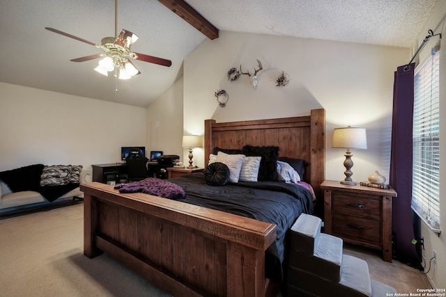 bedroom featuring a textured ceiling, vaulted ceiling with beams, light colored carpet, and ceiling fan