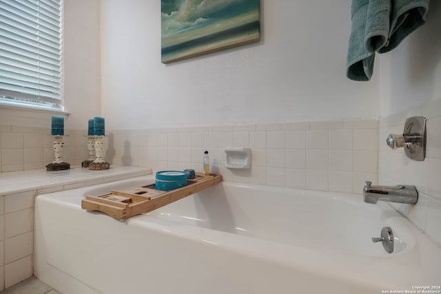 bathroom featuring a tub