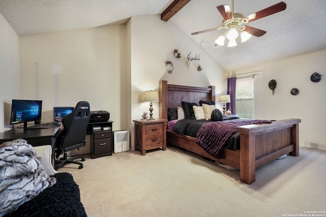 bedroom with lofted ceiling with beams, light carpet, a textured ceiling, and ceiling fan