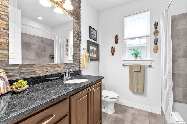 full bathroom featuring shower / tub combo, backsplash, vanity, tile patterned floors, and toilet