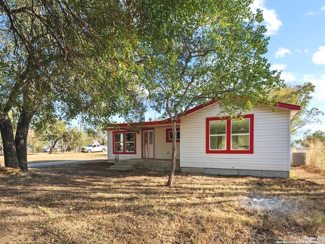 view of front of house featuring central AC unit