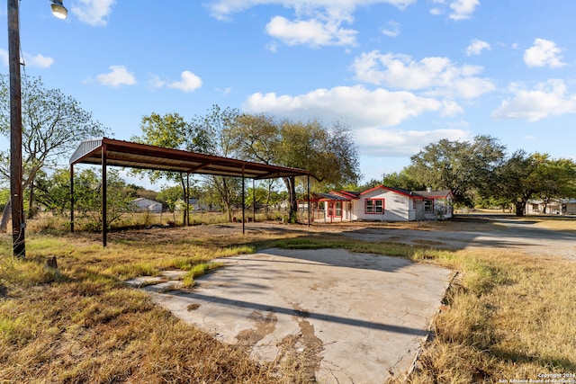 view of yard featuring a carport