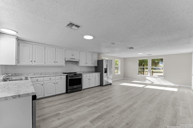 kitchen featuring range with electric cooktop, sink, stainless steel fridge with ice dispenser, white cabinetry, and light hardwood / wood-style floors