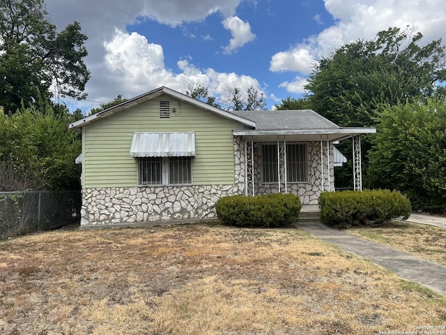 627 Canton, San Antonio, TX 78202 - bungalow with stone siding and covered porch
