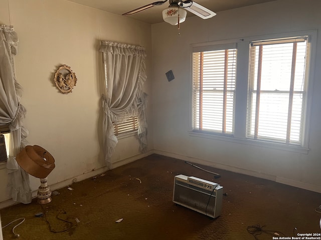 unfurnished room featuring ceiling fan