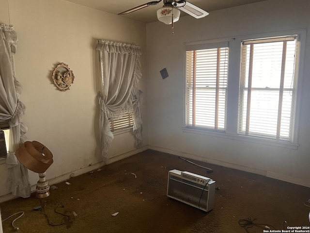 627 Canton, San Antonio, TX 78202 - carpeted spare room with heating unit, ceiling fan, and baseboards