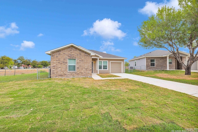 518 Precious Dr, San Antonio, TX 78237 - ranch-style home featuring a garage, brick siding, fence, a front lawn, and concrete driveway