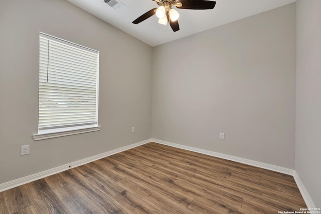 518 Precious Dr, San Antonio, TX 78237 - spare room with visible vents, baseboards, ceiling fan, and wood finished floors