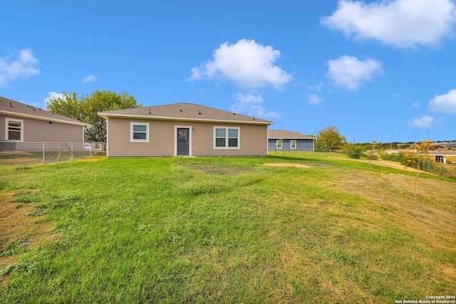 518 Precious Dr, San Antonio, TX 78237 - back of house featuring fence and a yard