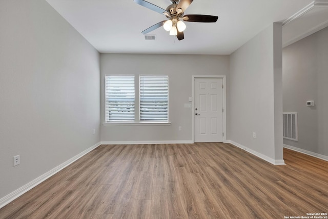 518 Precious Dr, San Antonio, TX 78237 - spare room with visible vents, a ceiling fan, and wood finished floors