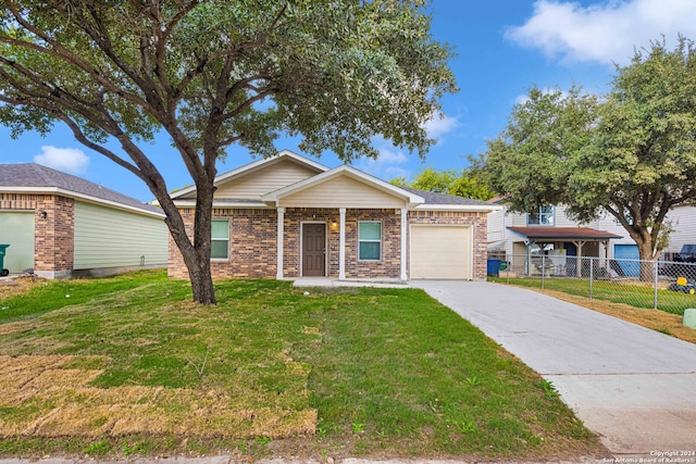 ranch-style home featuring a garage and a front lawn