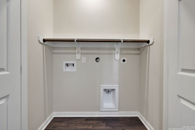 laundry area with hookup for a gas dryer, dark wood-type flooring, washer hookup, and electric dryer hookup