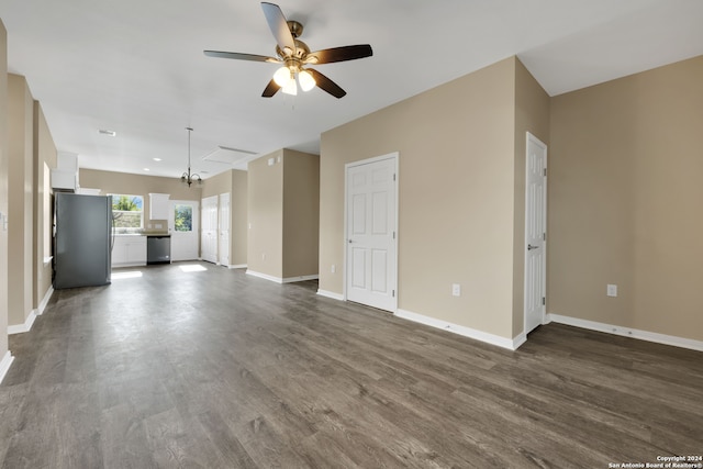 unfurnished living room featuring hardwood / wood-style flooring and ceiling fan