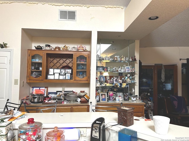 bar with a textured ceiling