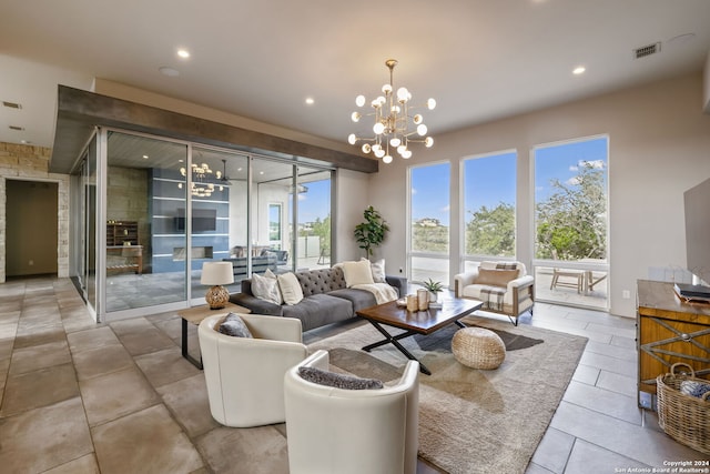 living room with an inviting chandelier