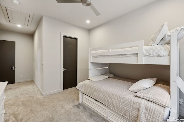 bedroom featuring light carpet and ceiling fan