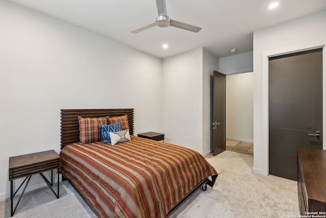 bedroom with light carpet and ceiling fan