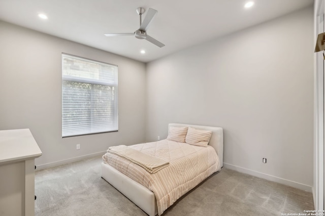 carpeted bedroom with ceiling fan